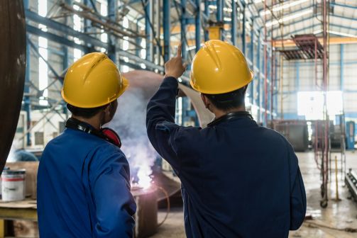 two technicians in warehouse