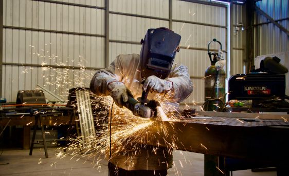 a technician welding metal
